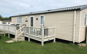 6 Berth Caravan With Decking At Kessingland Beach In Suffolk Ref 90045Sg